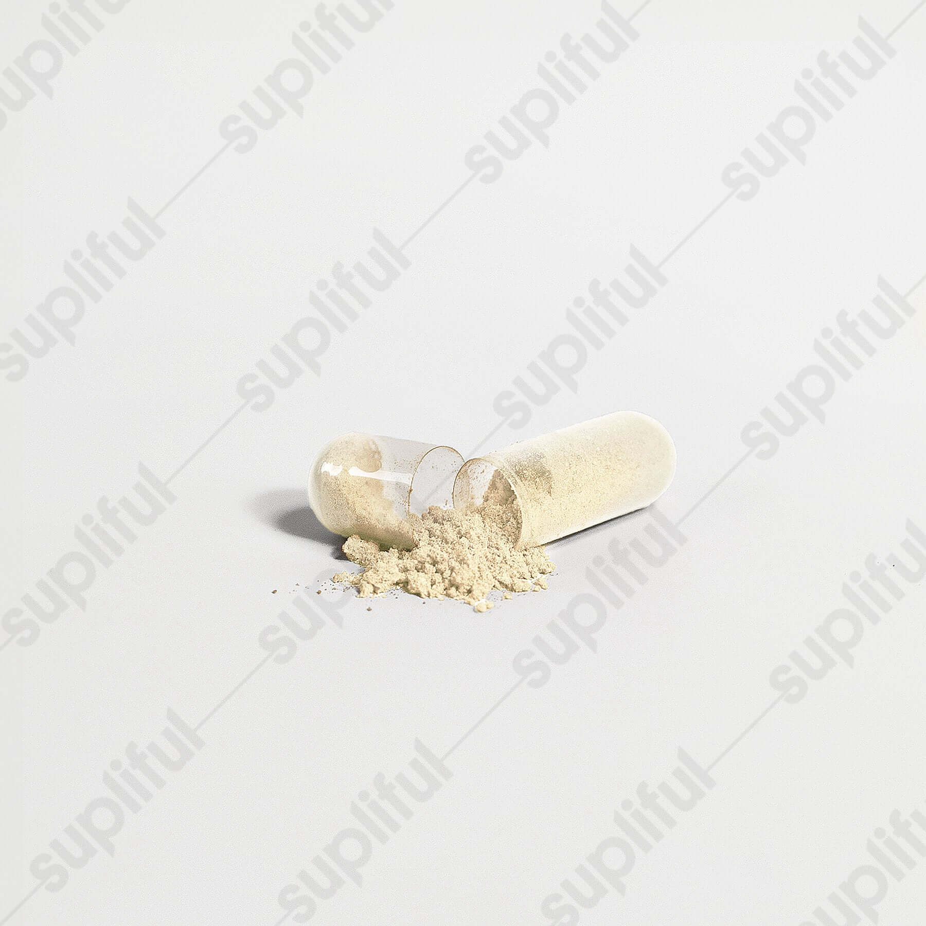 Open dietary supplement capsule with powder spilling out for gut health support.